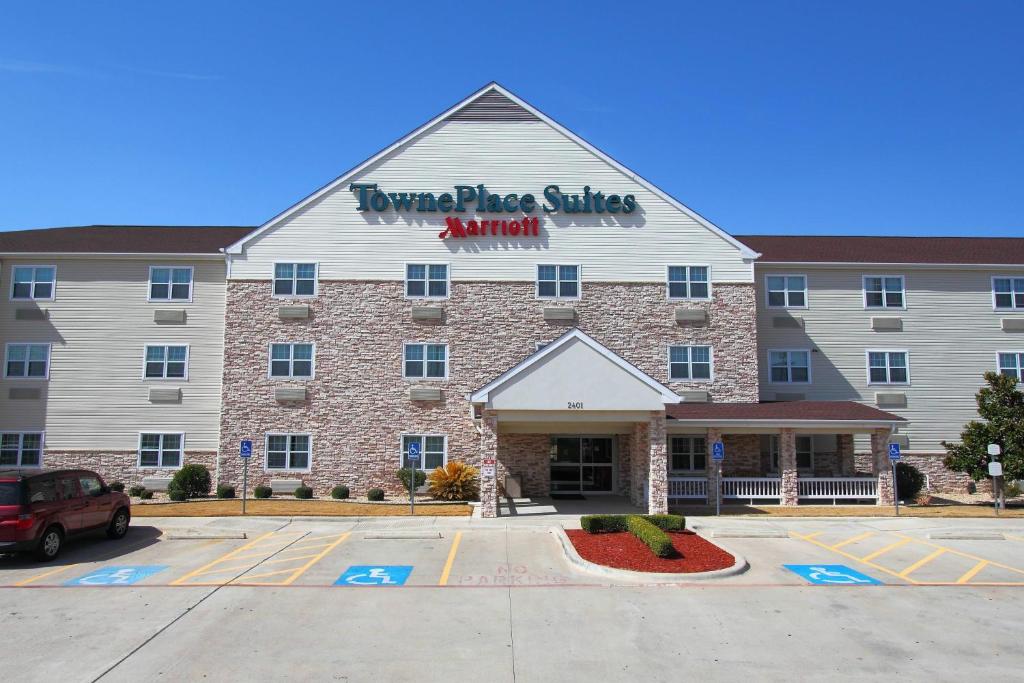 a hotel with a sign on the front of it at TownePlace Suites by Marriott Killeen in Killeen