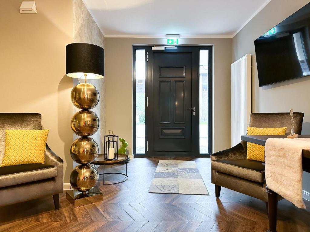Posezení v ubytování Hotel Restaurant Hackmann-Atter