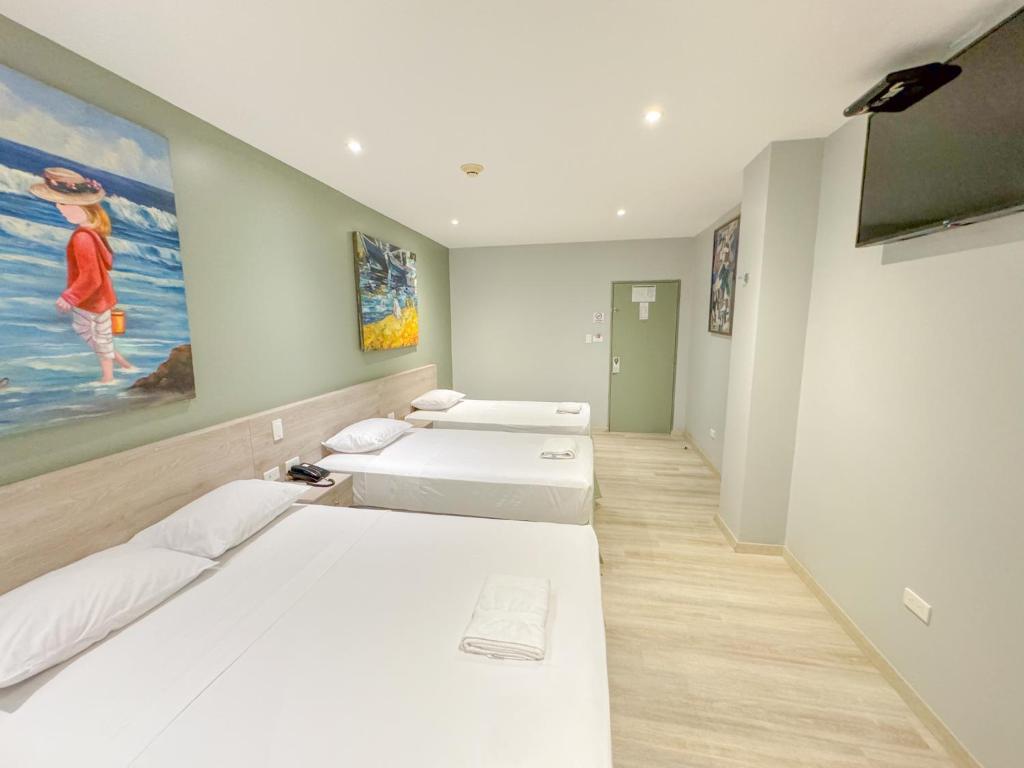 Postel nebo postele na pokoji v ubytování GH Sander Hotel