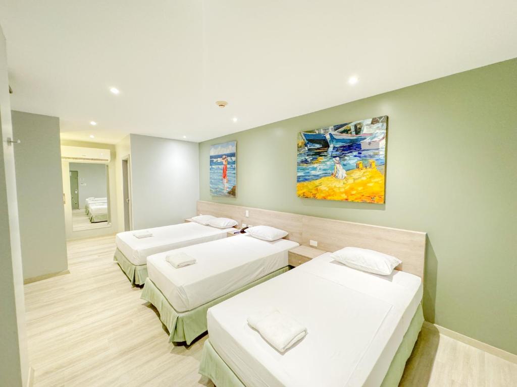 Postel nebo postele na pokoji v ubytování GH Sander Hotel