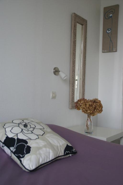 Postel nebo postele na pokoji v ubytování Hôtel Des Deux Mers