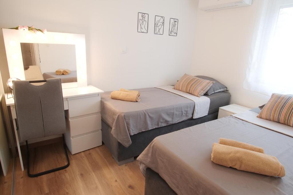 Postel nebo postele na pokoji v ubytování House Bonita