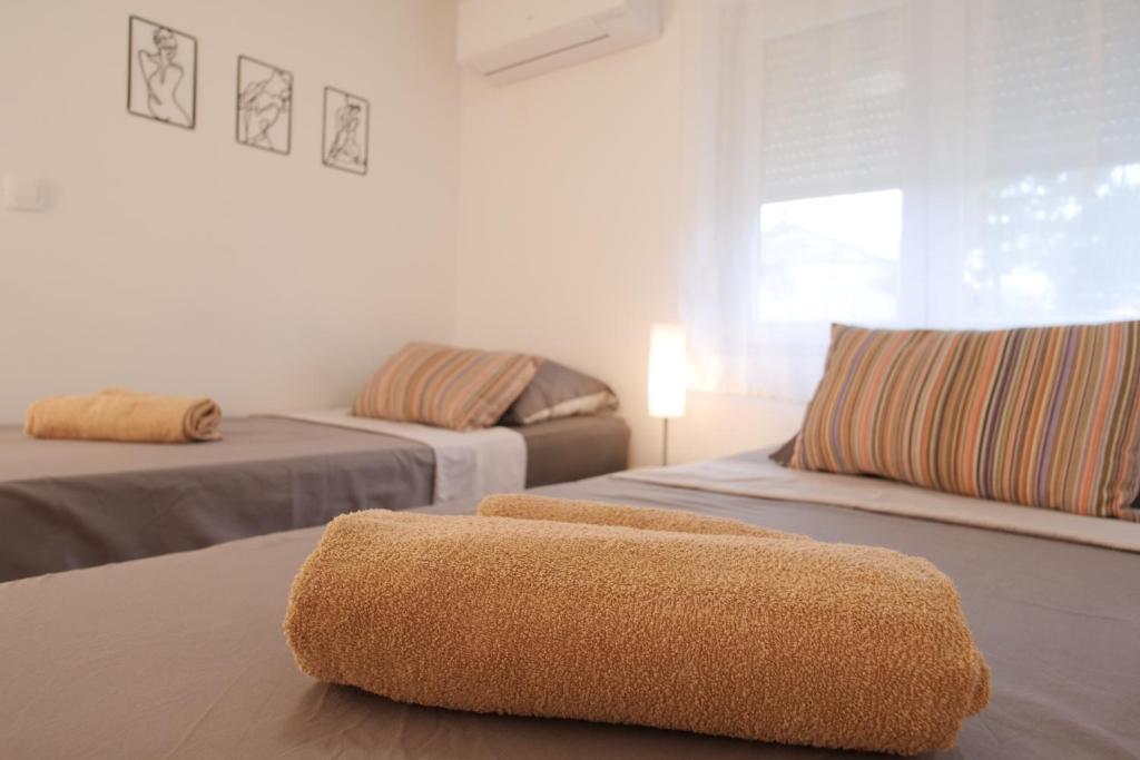 Postel nebo postele na pokoji v ubytování House Bonita