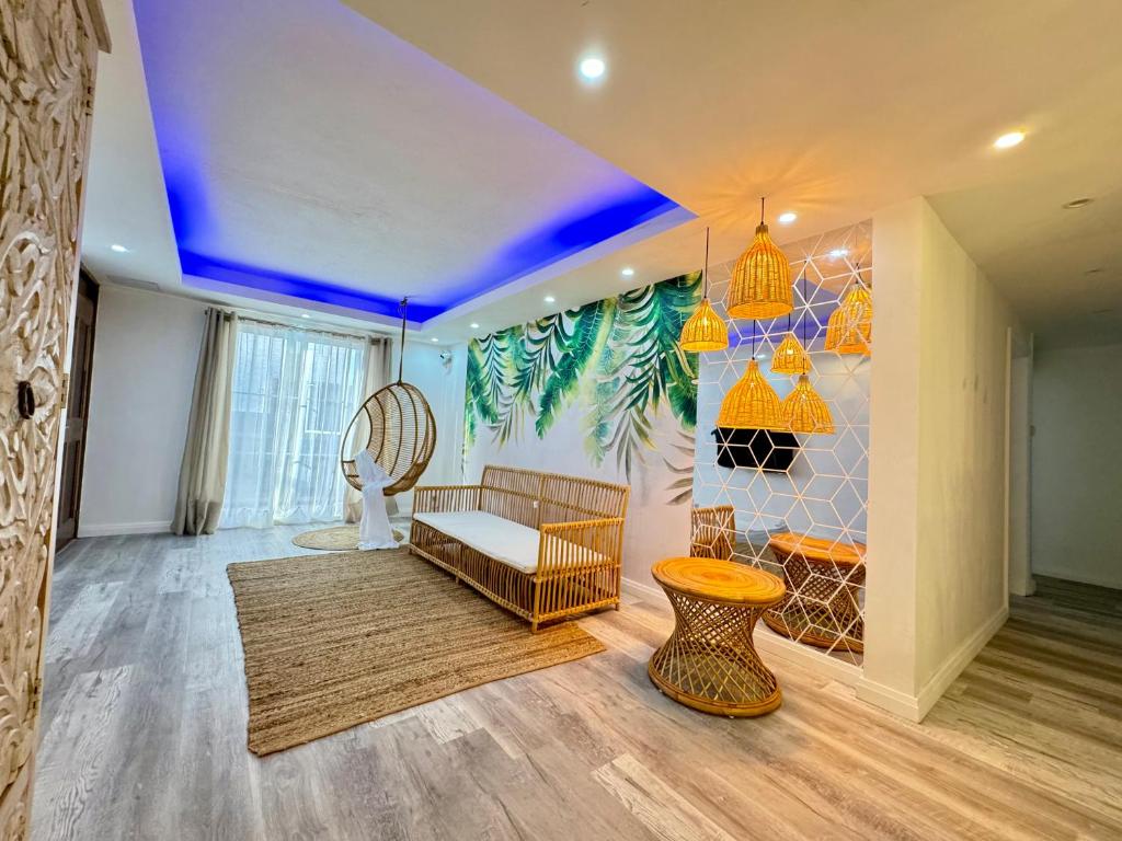 a living room with a couch and a table at Vans Haven in Curepipe