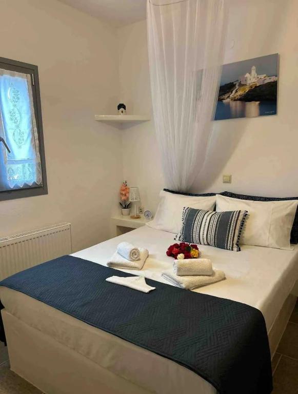 Postel nebo postele na pokoji v ubytování Diavrouxas House in Sifnos