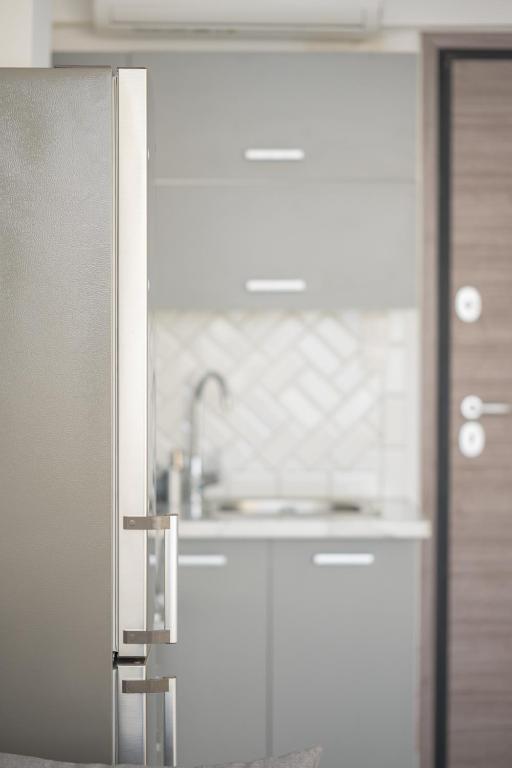 Kuchyň nebo kuchyňský kout v ubytování Ble Property Atlas