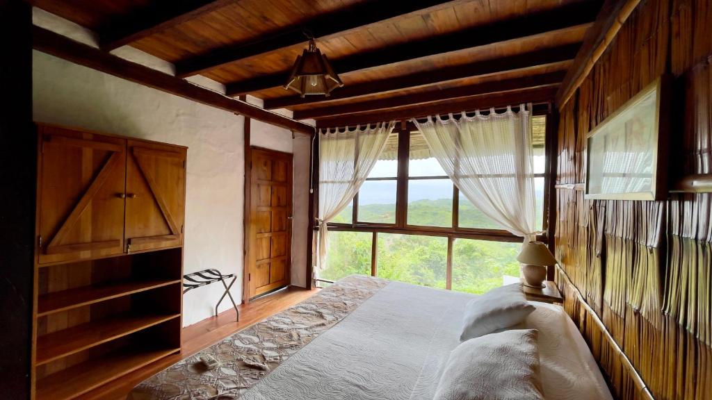 Postel nebo postele na pokoji v ubytování Samai Lodge Holistic Living