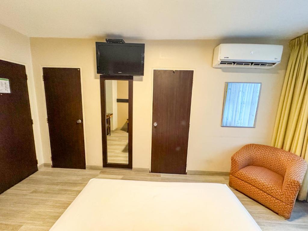 Postel nebo postele na pokoji v ubytování GH Alexander Hotel