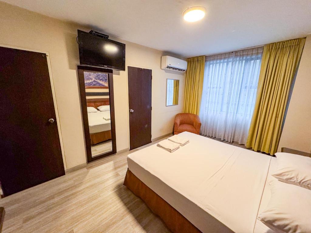 Postel nebo postele na pokoji v ubytování GH Alexander Hotel