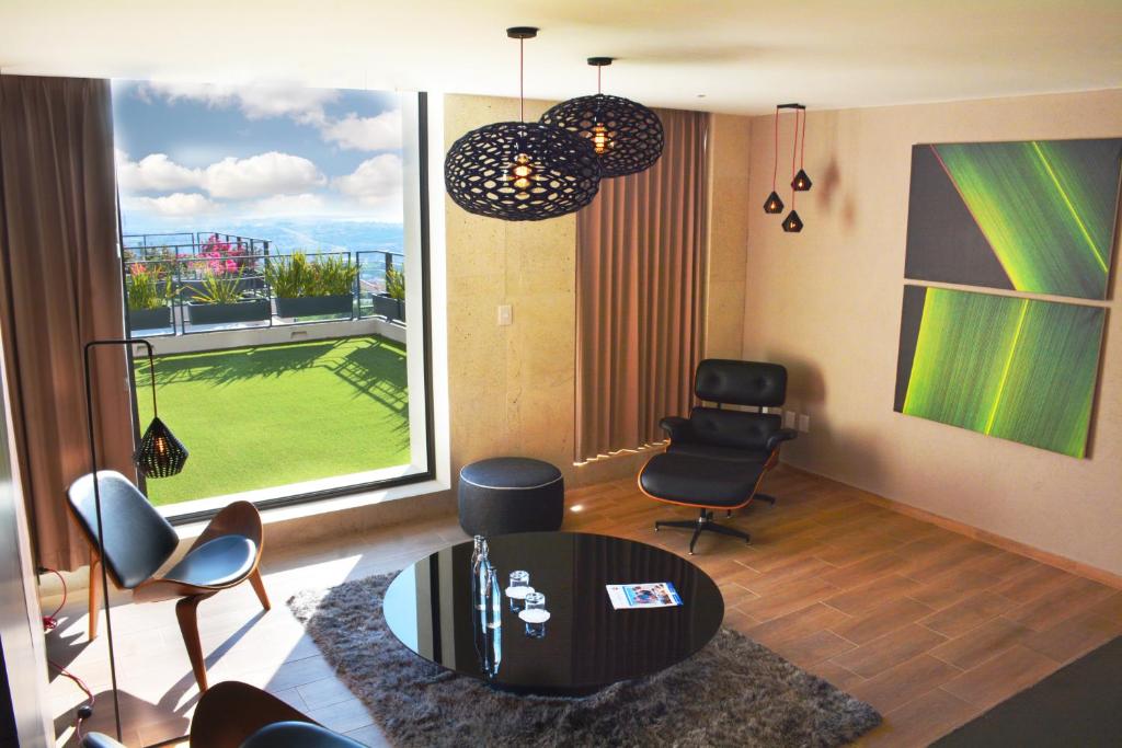 Posezení v ubytování Ilo Rojo Hotel Boutique