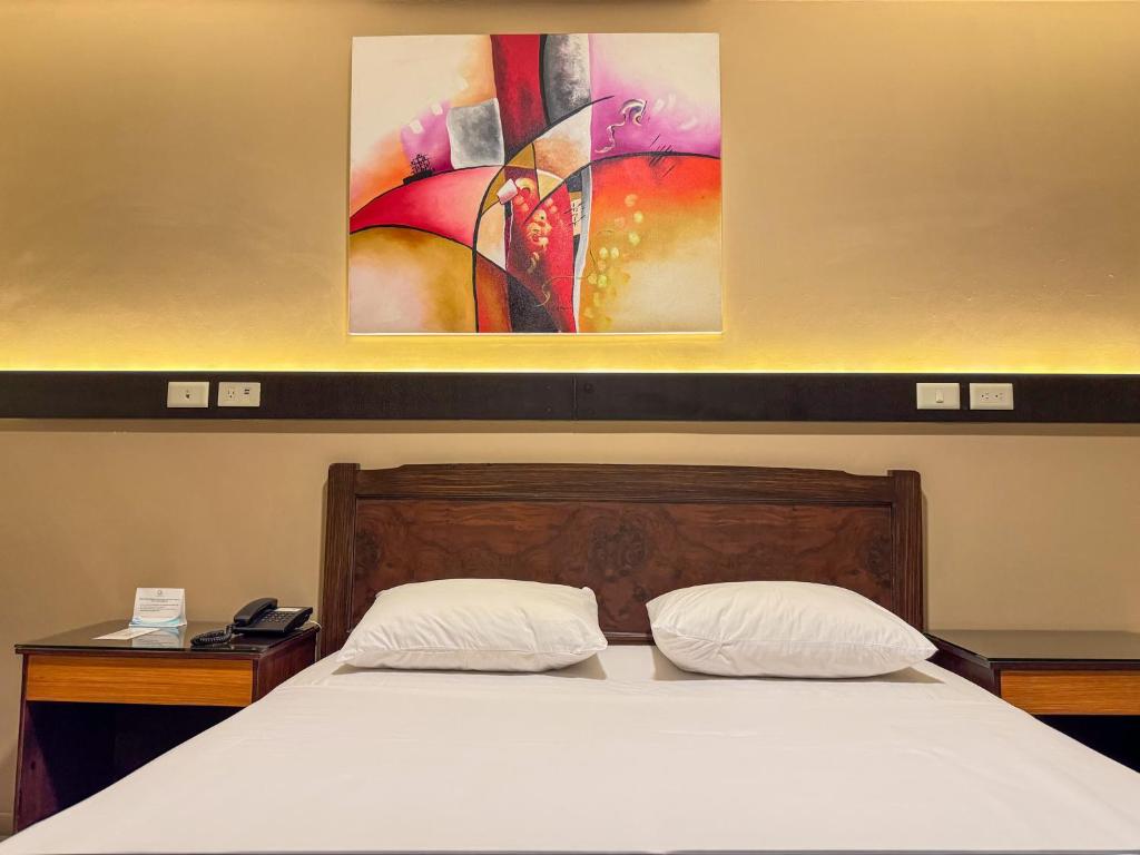 Postel nebo postele na pokoji v ubytování GH Alexander Hotel