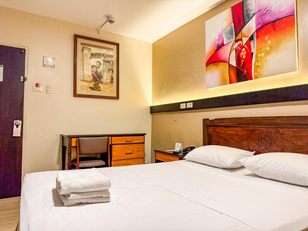 Postel nebo postele na pokoji v ubytování GH Alexander Hotel