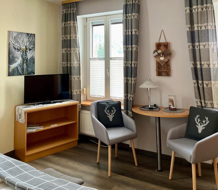 TV a/nebo společenská místnost v ubytování Gasthaus Schützen