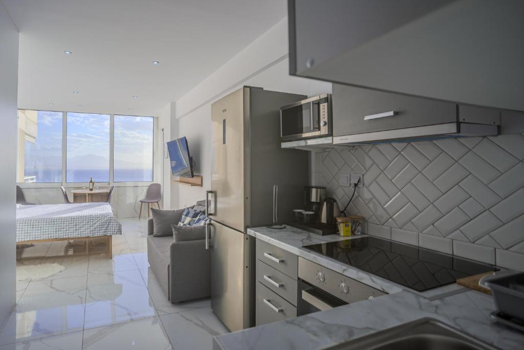 Kuchyň nebo kuchyňský kout v ubytování Ble Property Atlas