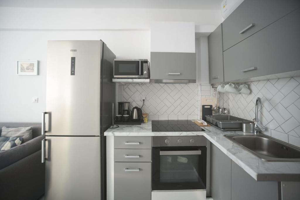 Kuchyň nebo kuchyňský kout v ubytování Ble Property Atlas