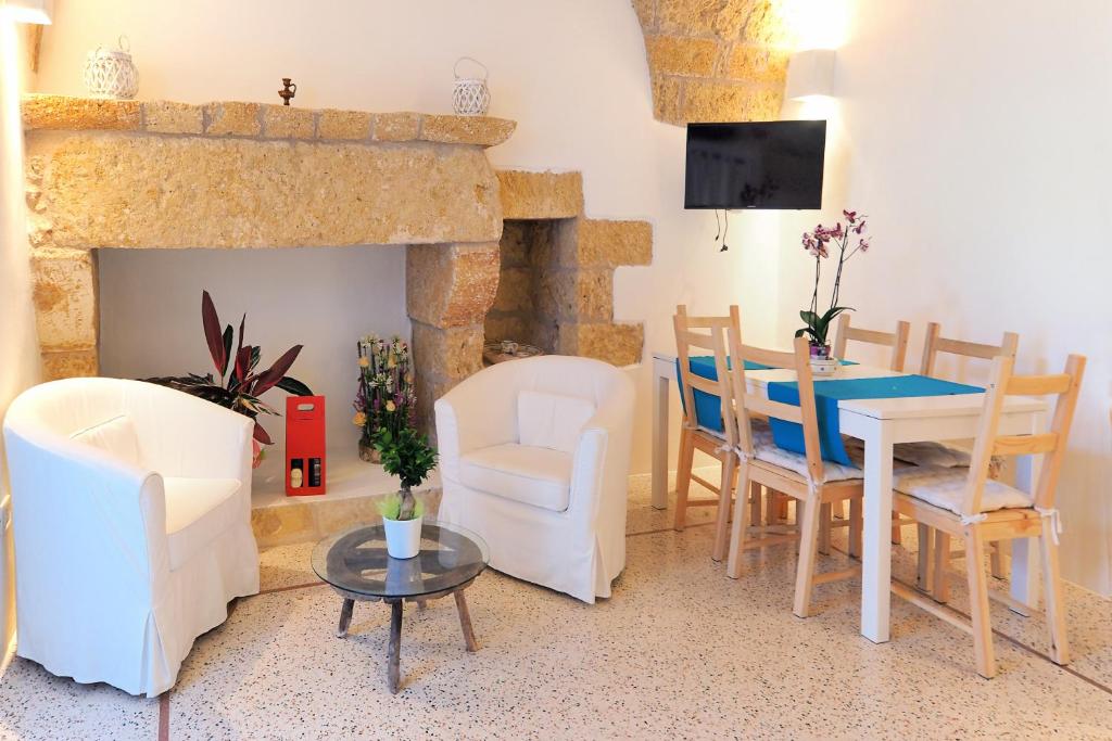 Posezení v ubytování Holiday home La Corte dei Pirri