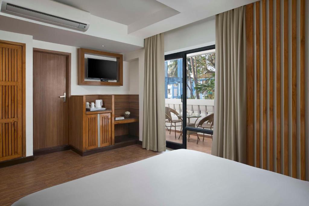Postel nebo postele na pokoji v ubytování Park Inn by Radisson Goa Candolim