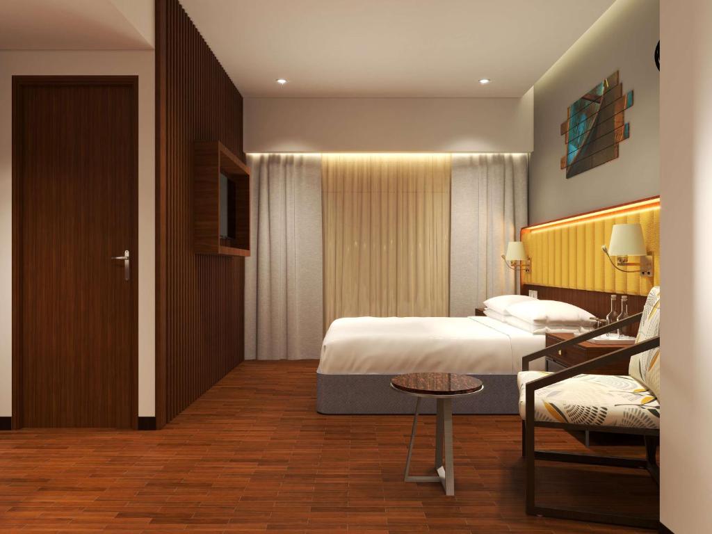 Postel nebo postele na pokoji v ubytování Park Inn by Radisson Goa Candolim