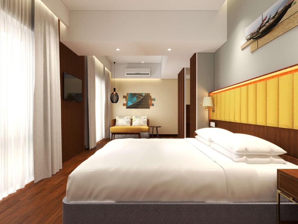 Postel nebo postele na pokoji v ubytování Park Inn by Radisson Goa Candolim