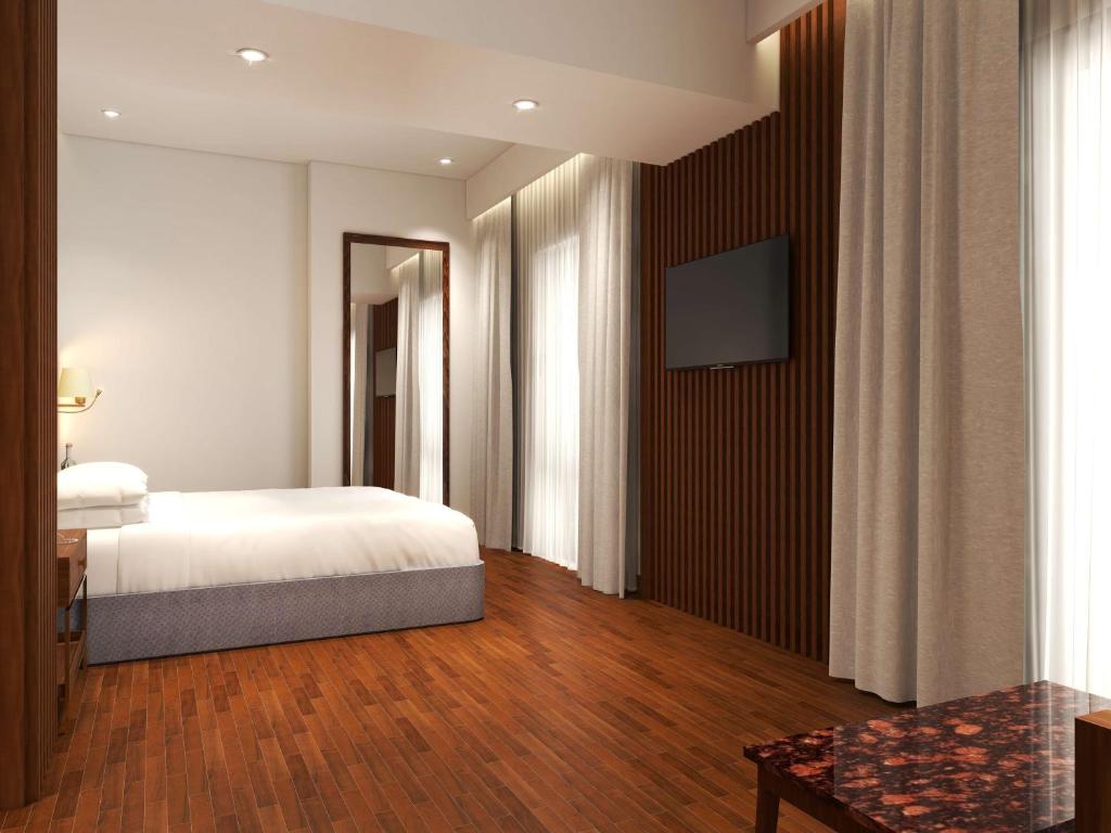Postel nebo postele na pokoji v ubytování Park Inn by Radisson Goa Candolim