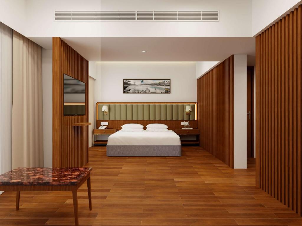 Postel nebo postele na pokoji v ubytování Park Inn by Radisson Goa Candolim