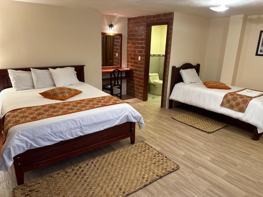 Postel nebo postele na pokoji v ubytování Spa Hotel Etelvina