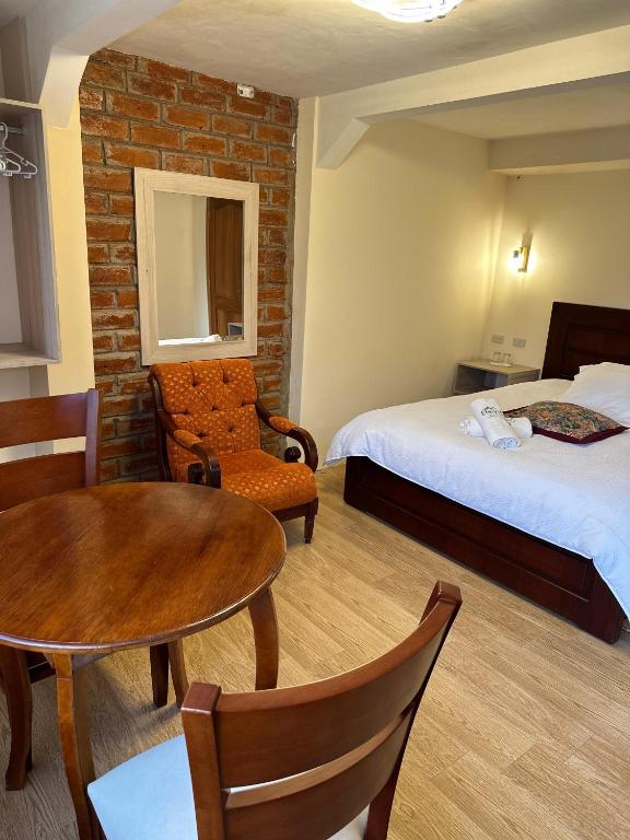 Postel nebo postele na pokoji v ubytování Spa Hotel Etelvina