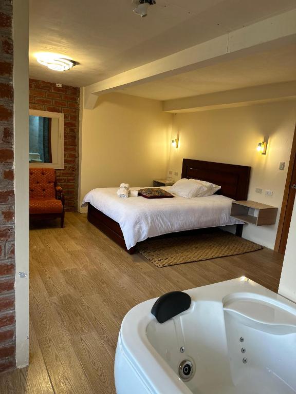 Postel nebo postele na pokoji v ubytování Spa Hotel Etelvina