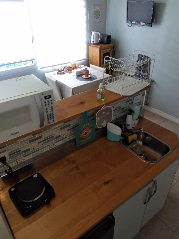 Kuchyň nebo kuchyňský kout v ubytování Buenavida Guesthouse