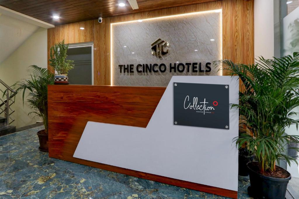 a sign in front of a ciao hotels lobby at Townhouse 1338 The Cinco Bliss in Hyderabad