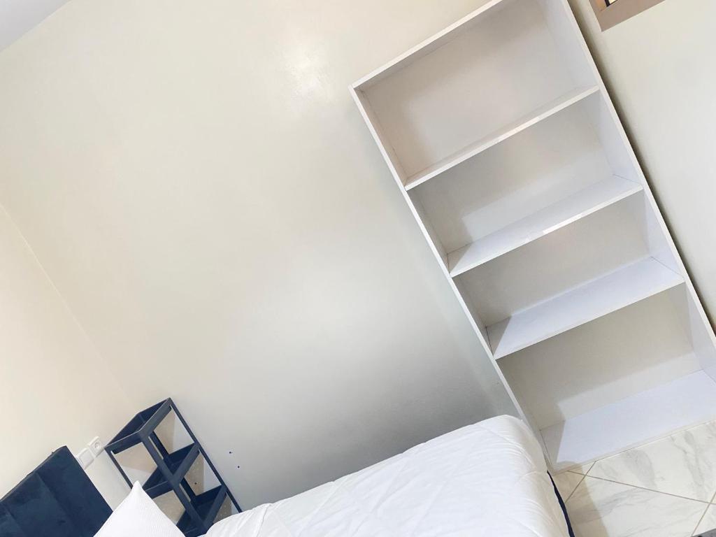 Postel nebo postele na pokoji v ubytování Dakhla sky blue