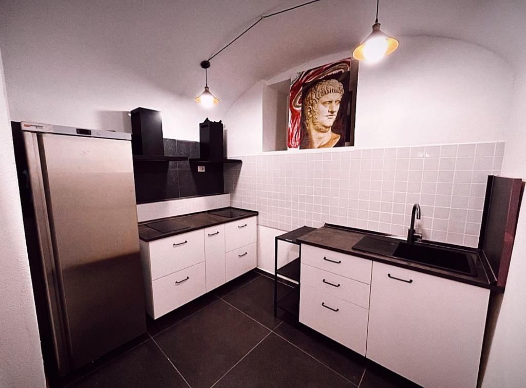 Kuchyň nebo kuchyňský kout v ubytování Melting Pot Rome