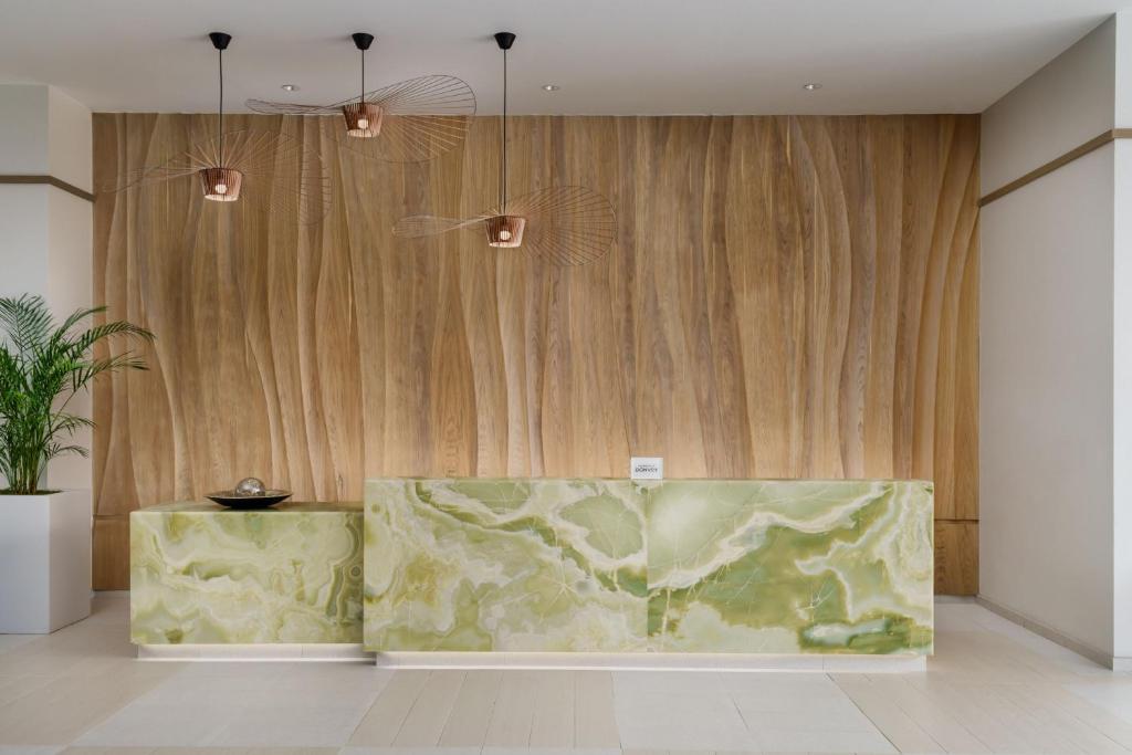 Гостиная зона в AC Hotel by Marriott Naples 5th Avenue