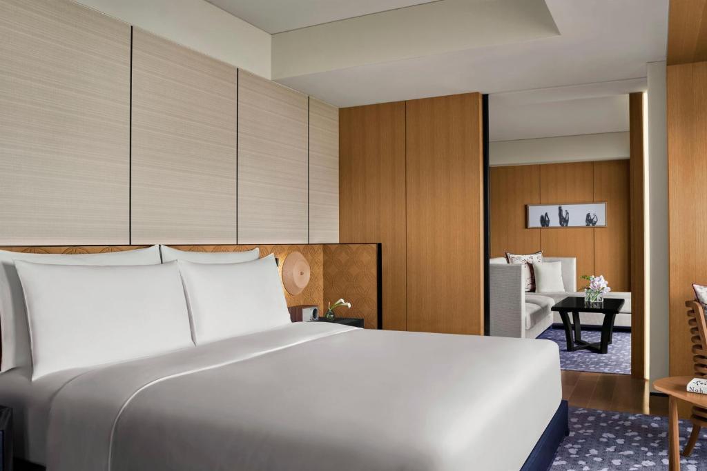 Postel nebo postele na pokoji v ubytování The Ritz-Carlton Kyoto
