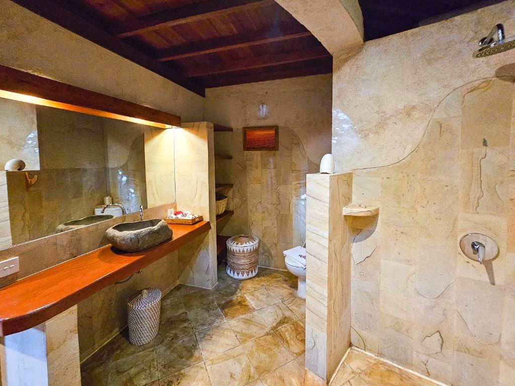 Koupelna v ubytování Keong Villas