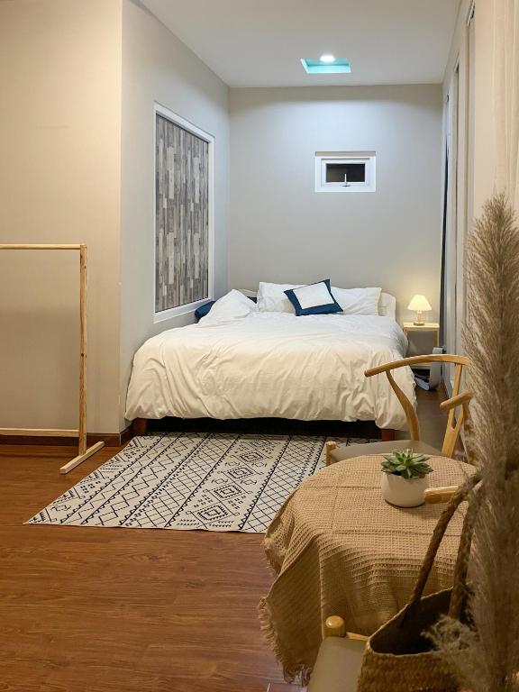 Giường trong phòng chung tại Nai Homestay