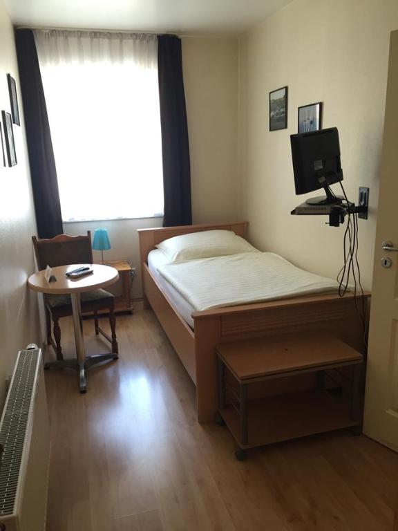 Postel nebo postele na pokoji v ubytování Hotel Restaurant Zagreb