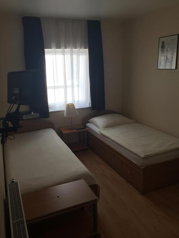 Postel nebo postele na pokoji v ubytování Hotel Restaurant Zagreb