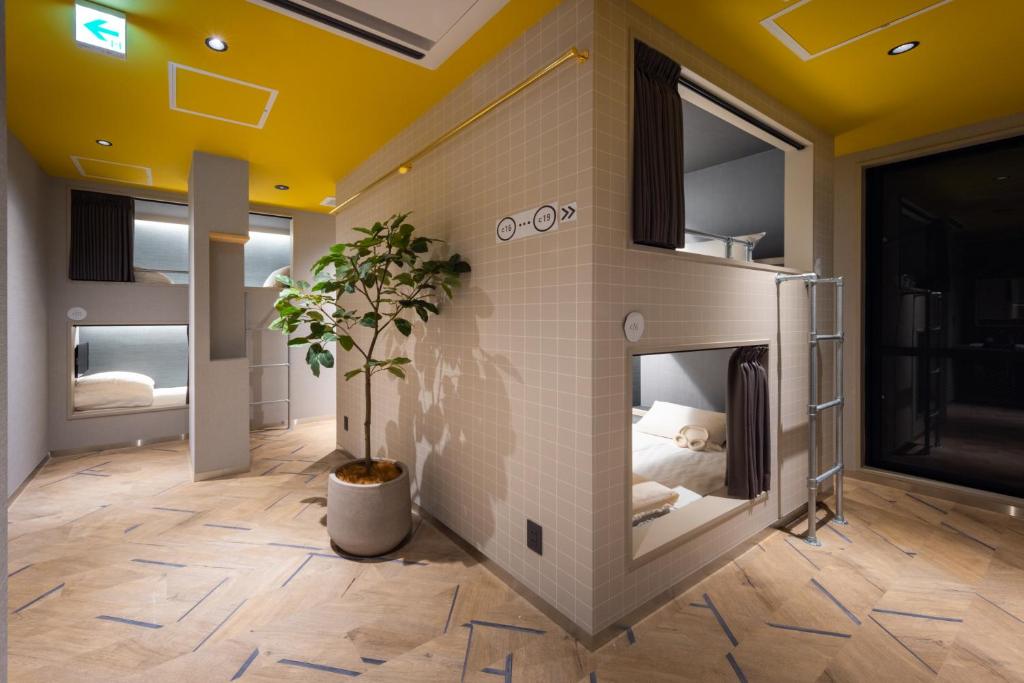 Postel nebo postele na pokoji v ubytování Sai Hotel