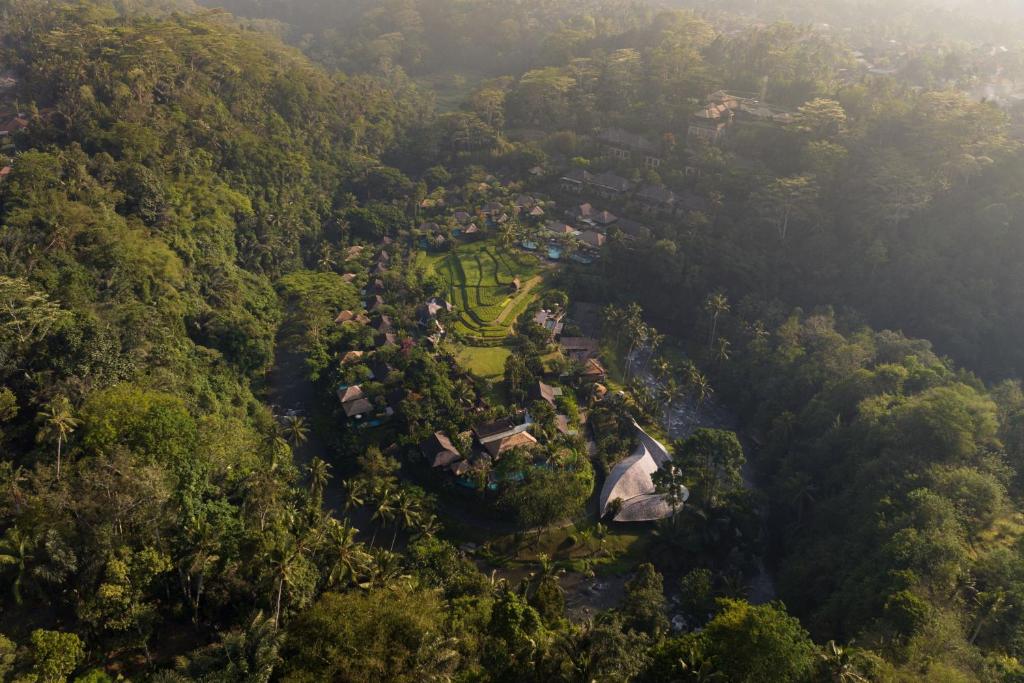 an aerial view of a village in the middle of a forest at Mandapa, a Ritz-Carlton Reserve in Ubud