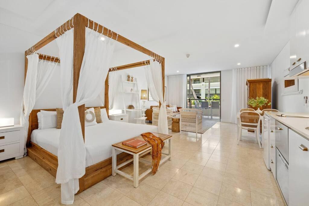 Postel nebo postele na pokoji v ubytování La Petit Unite - Luxe Santai Studio by uHoliday