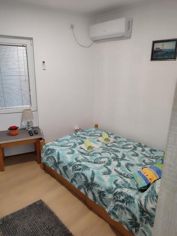 Postel nebo postele na pokoji v ubytování Živanović MT Srebrno jezero