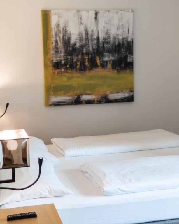 Postel nebo postele na pokoji v ubytování Hotel Matteo