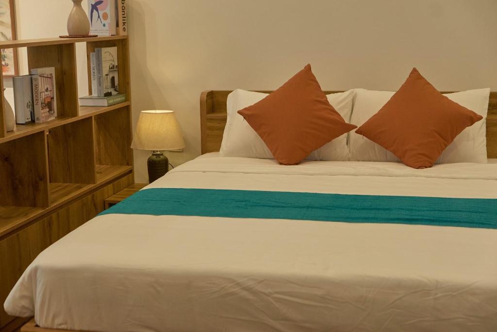 Postel nebo postele na pokoji v ubytování Hanoi Shouten - Staycation