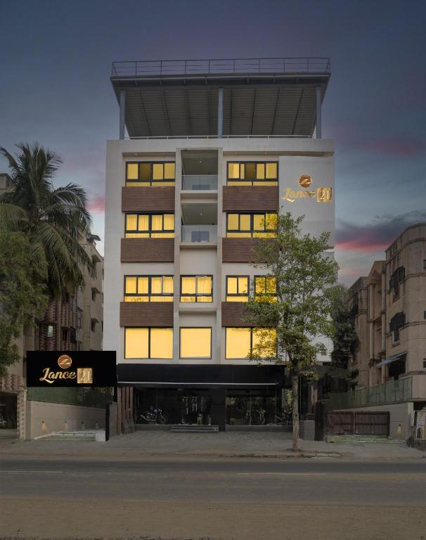 a tall building with many windows in a city at Lance 21 - Ashok Nagar in Chennai