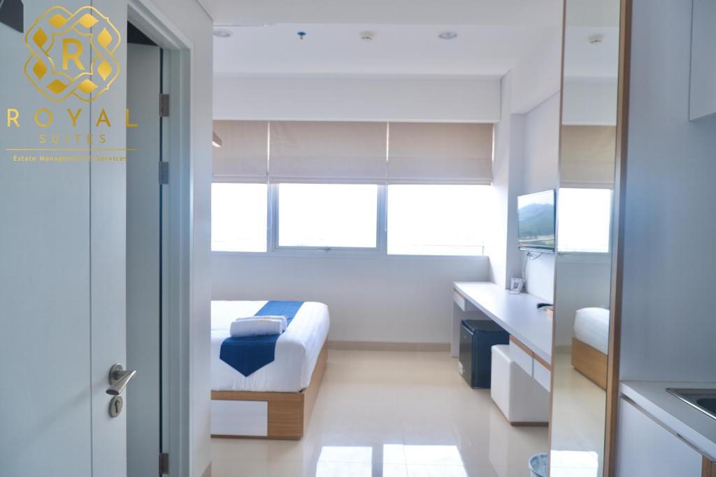 Postel nebo postele na pokoji v ubytování Royal Suites Studio 07RW - Nuvasa Bay Resort