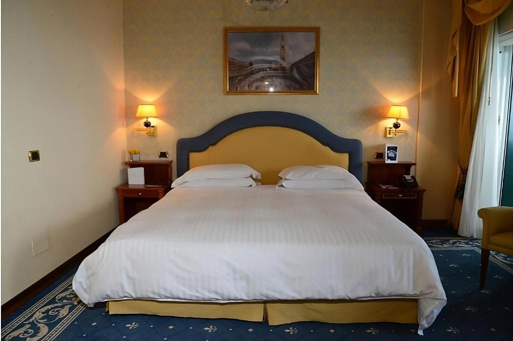 Posteľ alebo postele v izbe v ubytovaní Grand Hotel Del Mare Resort & Spa