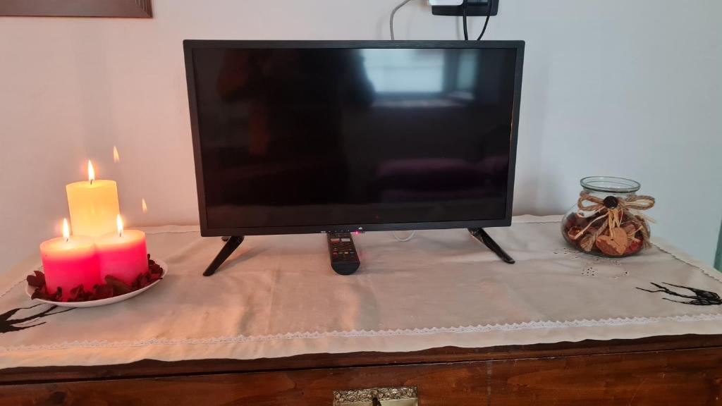 TV a/nebo společenská místnost v ubytování Casa delle rondini
