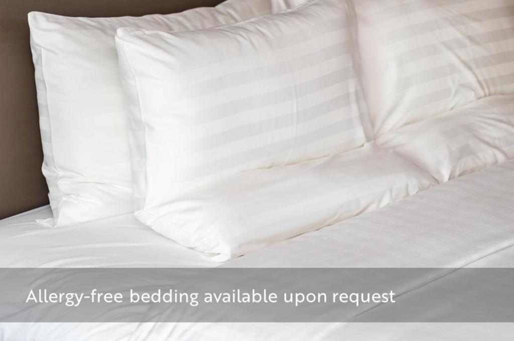 Letto o letti in una camera di City Stay Vienna – Lugeck