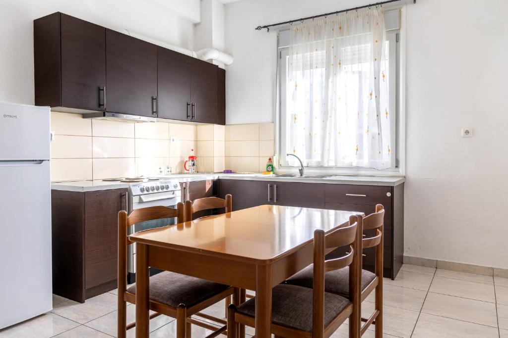 Kuchnia lub aneks kuchenny w obiekcie King home Larissa city